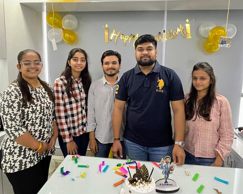 Team sharing celebration treats